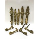 Original ornate Indian brass door furniture.