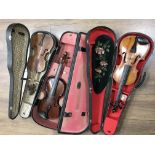 A collection of violins including an interesting v