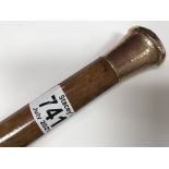 An Edwardian walking cane with 9ct gold top and a