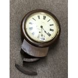 A wooden cased wall clock by Kuss Cameron & Co, Lo