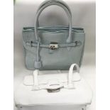 A pale blue leather Jasper Conran bag and a white