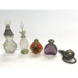 A small unusual round ball shaped scent bottle wit