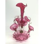 A cranberry glass epergne.