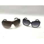 Two pairs of designer sunglasses, Dolce and Gabban