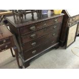 A George III chest with four graduated drawers rai