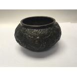 A Chinese bronze Censer bowl decorated with raised dragons marks to the base possible 20th century.