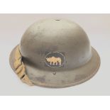 A WW2 British Helmet With Insignia To The 1St Armo