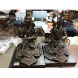 A pair of red lacquer traditional Thailand figures