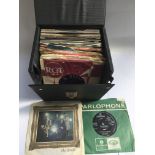 A record box of 7 inch singles by various artists