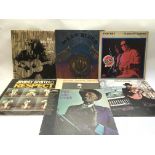 Seven blues LPs by various artists including John