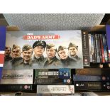 A collection of blu ray and DVD box sets and some