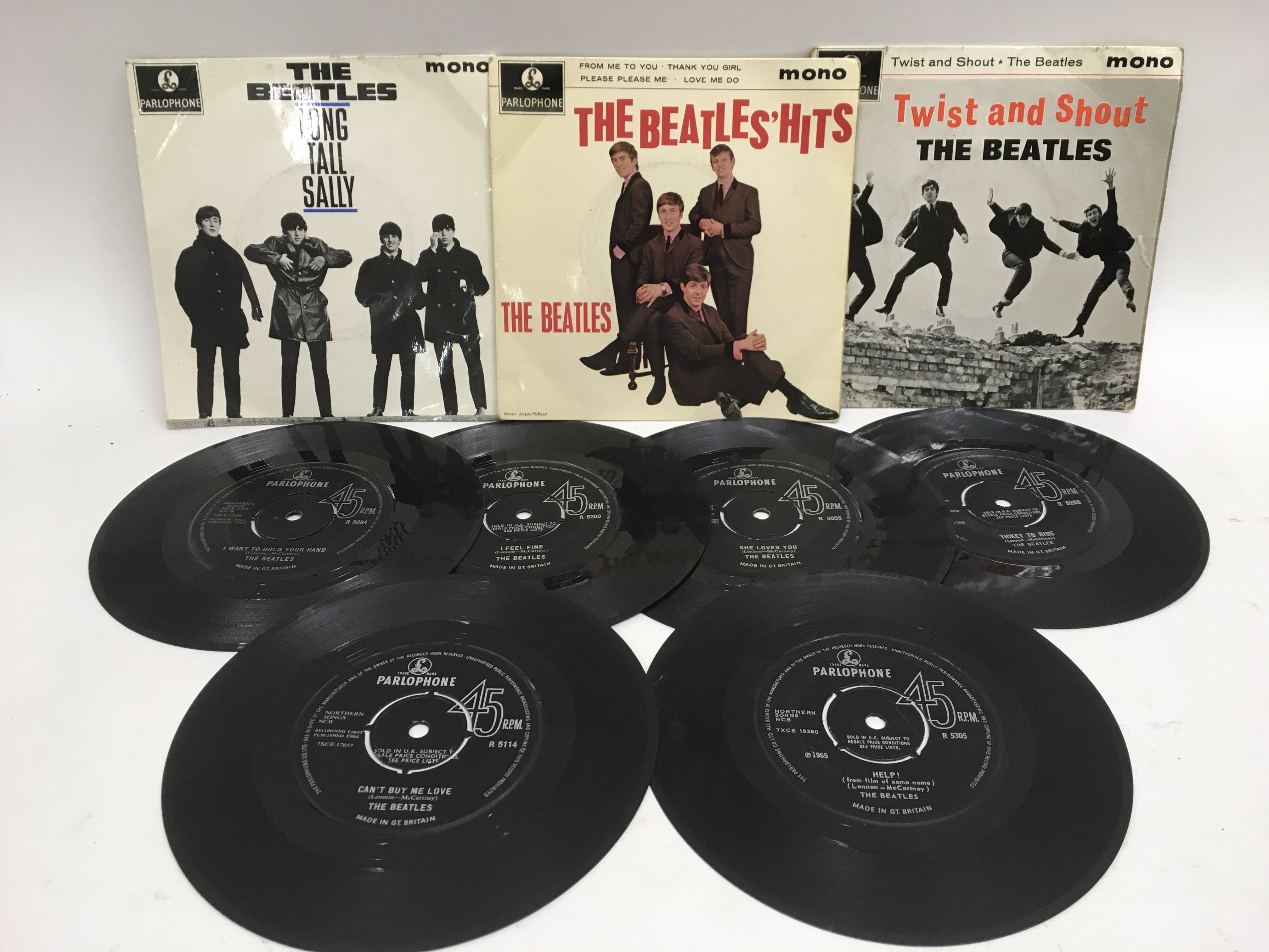 Three Beatles EPs and a collection of Beatles 7inc