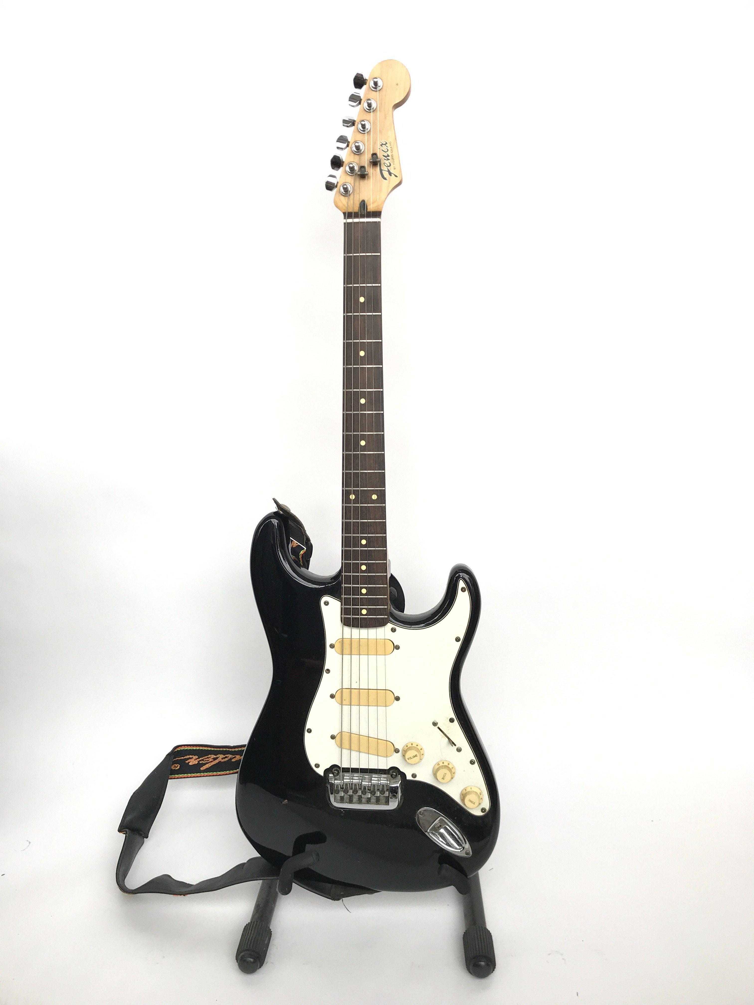 A Fenix by Young Chang black Stratocaster copy ele