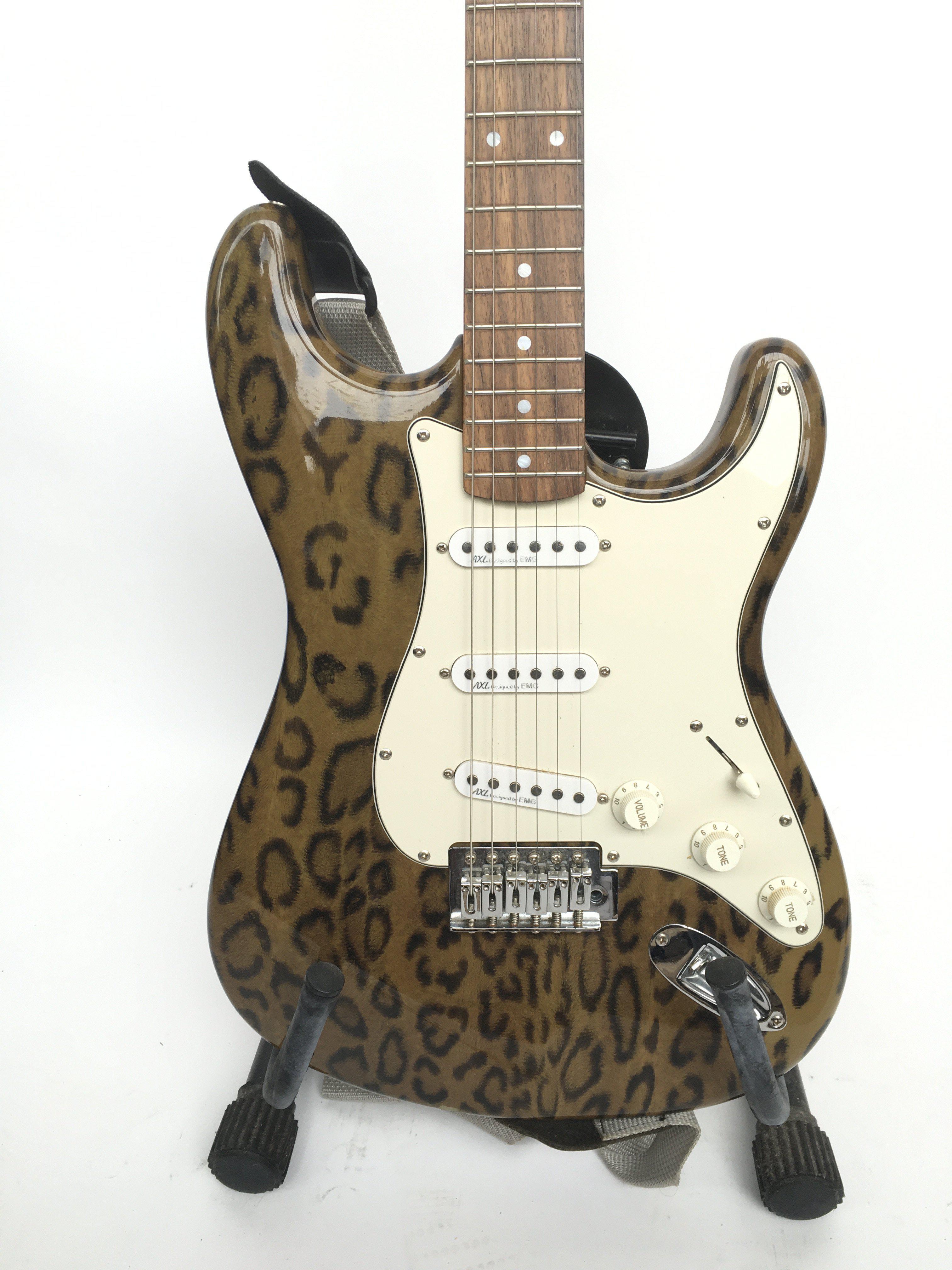 An AXL Strat style electric guitar with leopard pr - Image 3 of 4