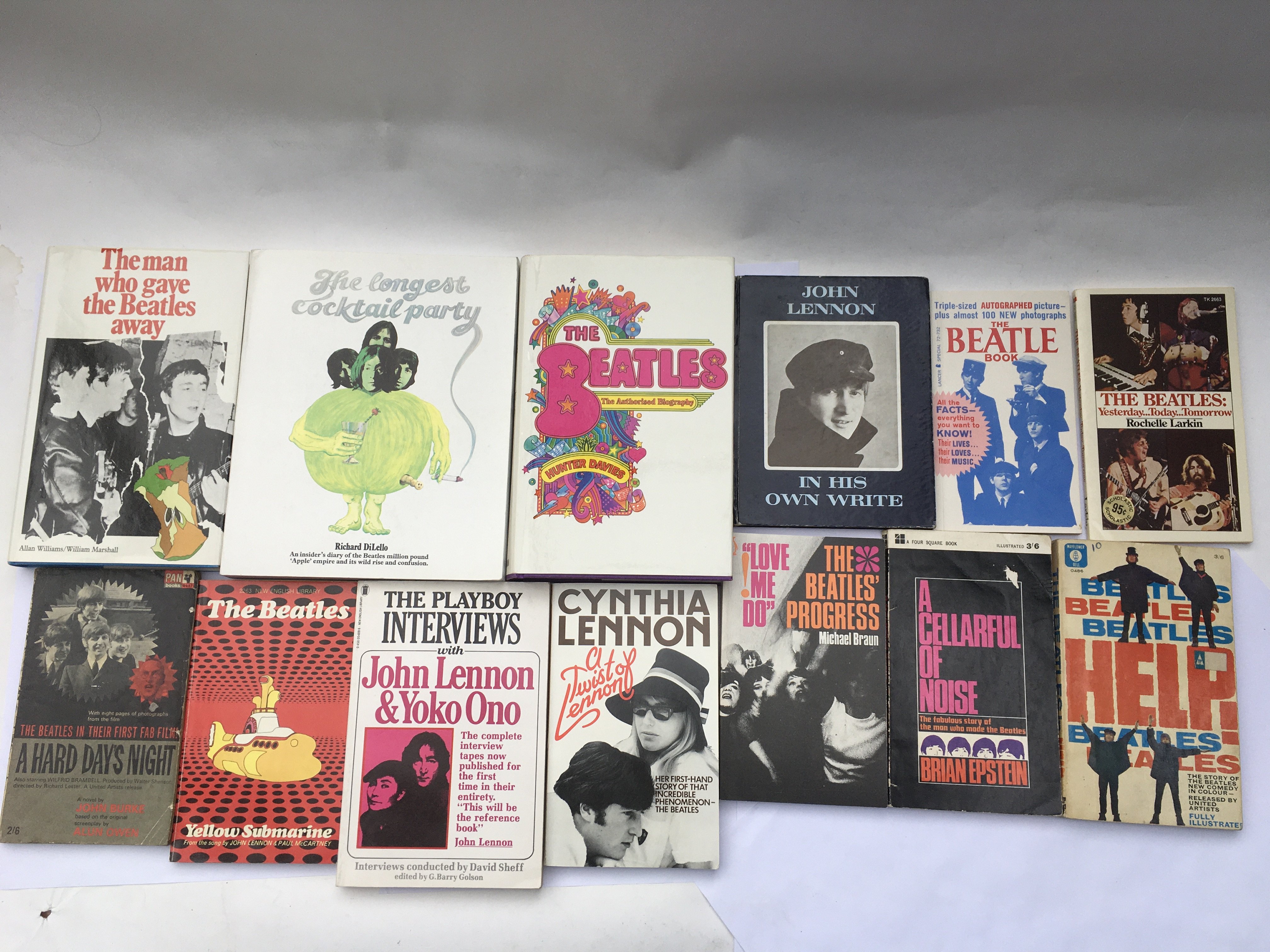 A collection of Beatles books including a signed A