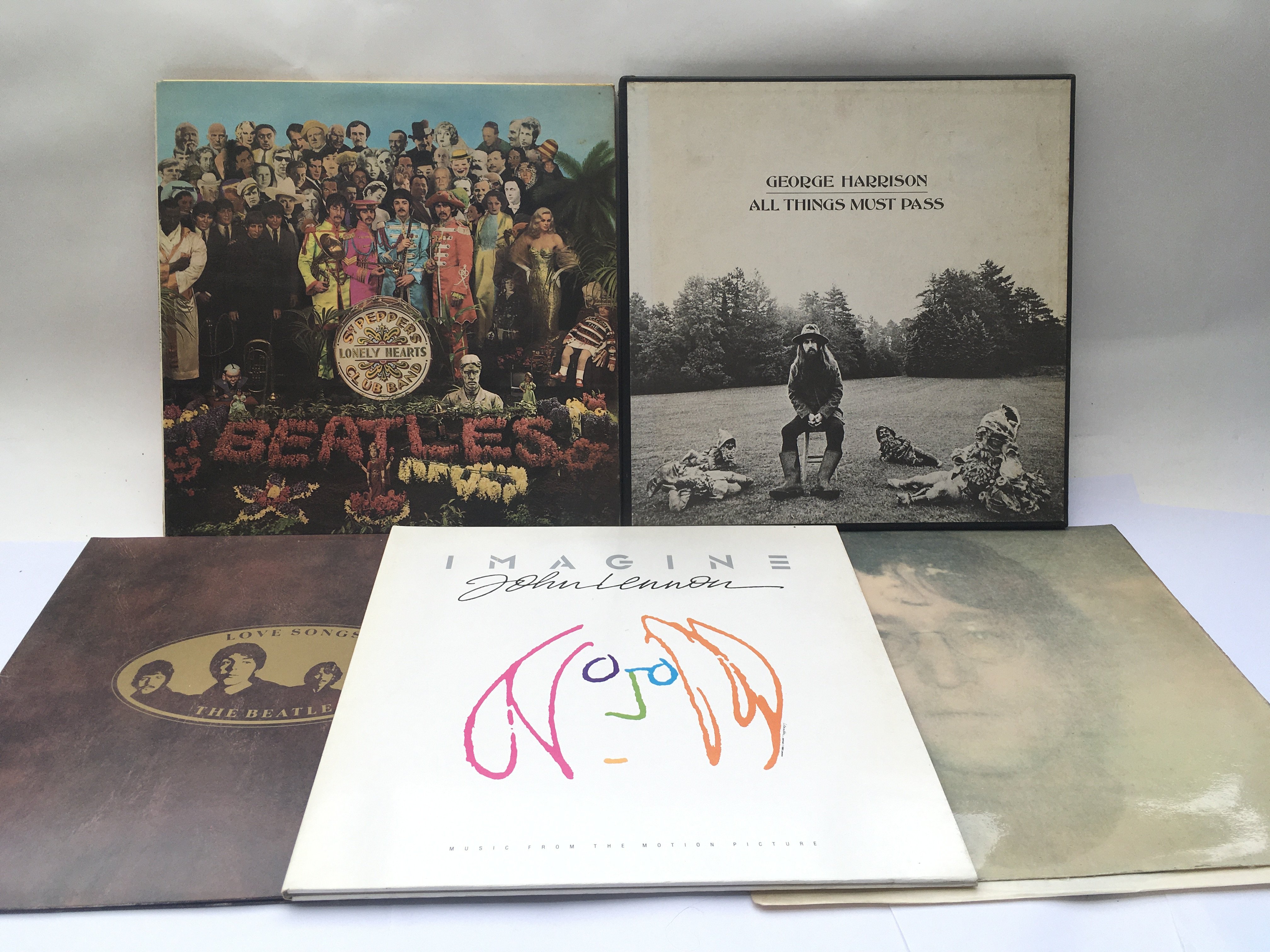 Five Beatles and solo LPs comprising an early UK p