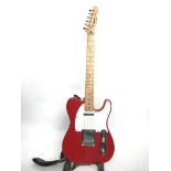 A 1995 Fender Squier Telecaster in red with a whit