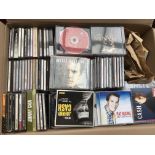 Two boxes of over 600 CDs, mainly country artists.