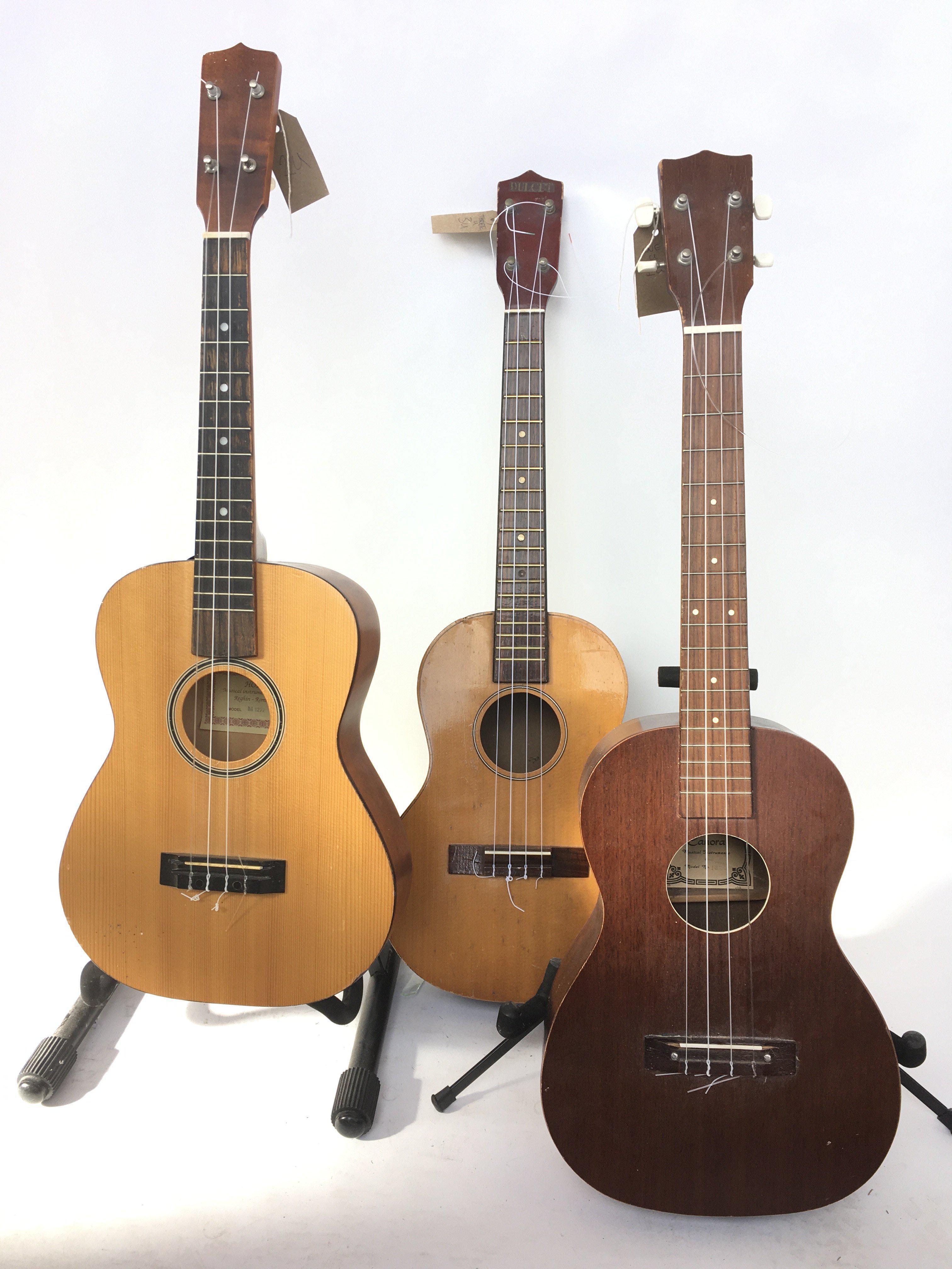 Three baritone ukeleles.