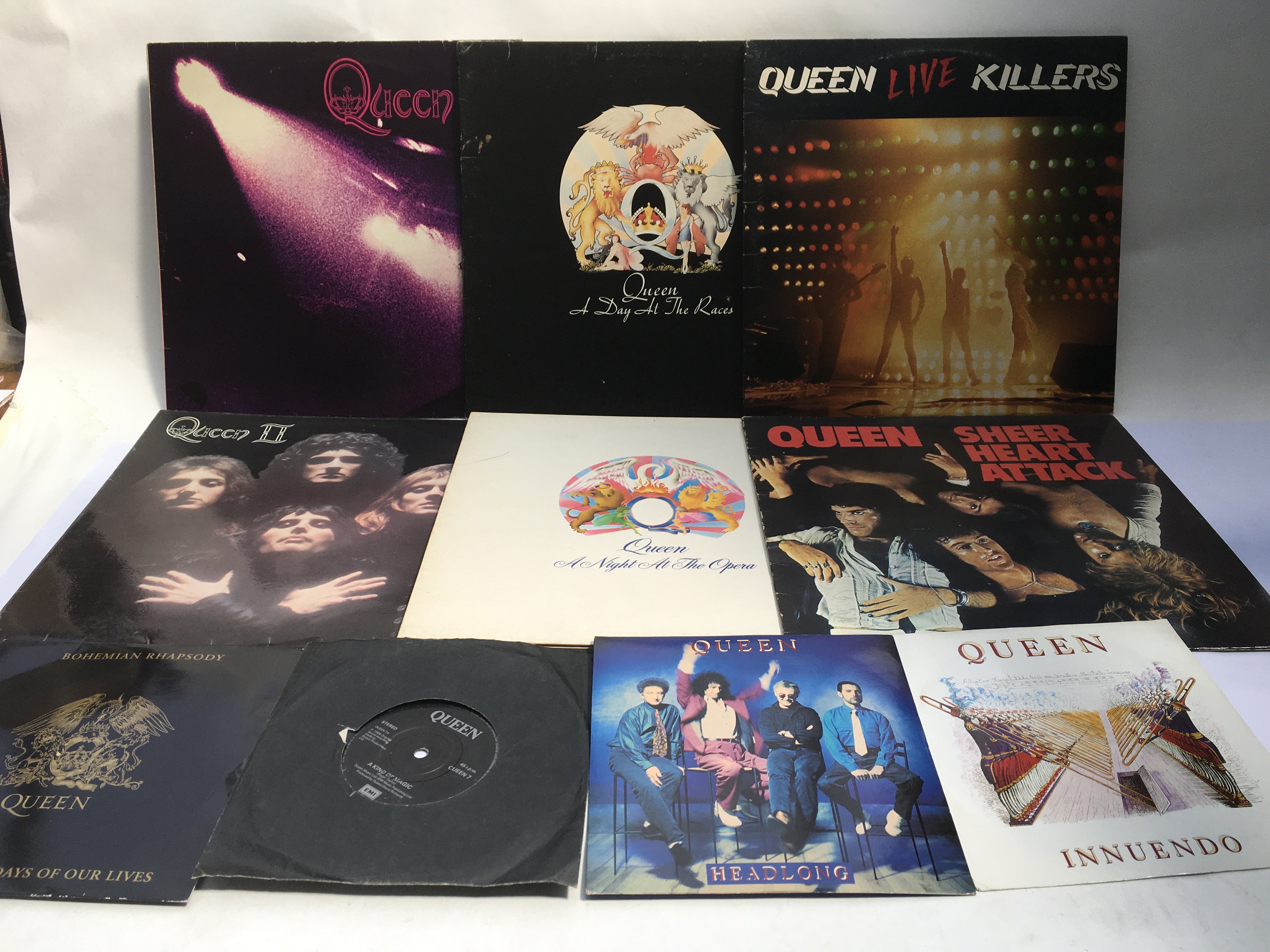 A collection of Queen LPs and 7inch singles compri