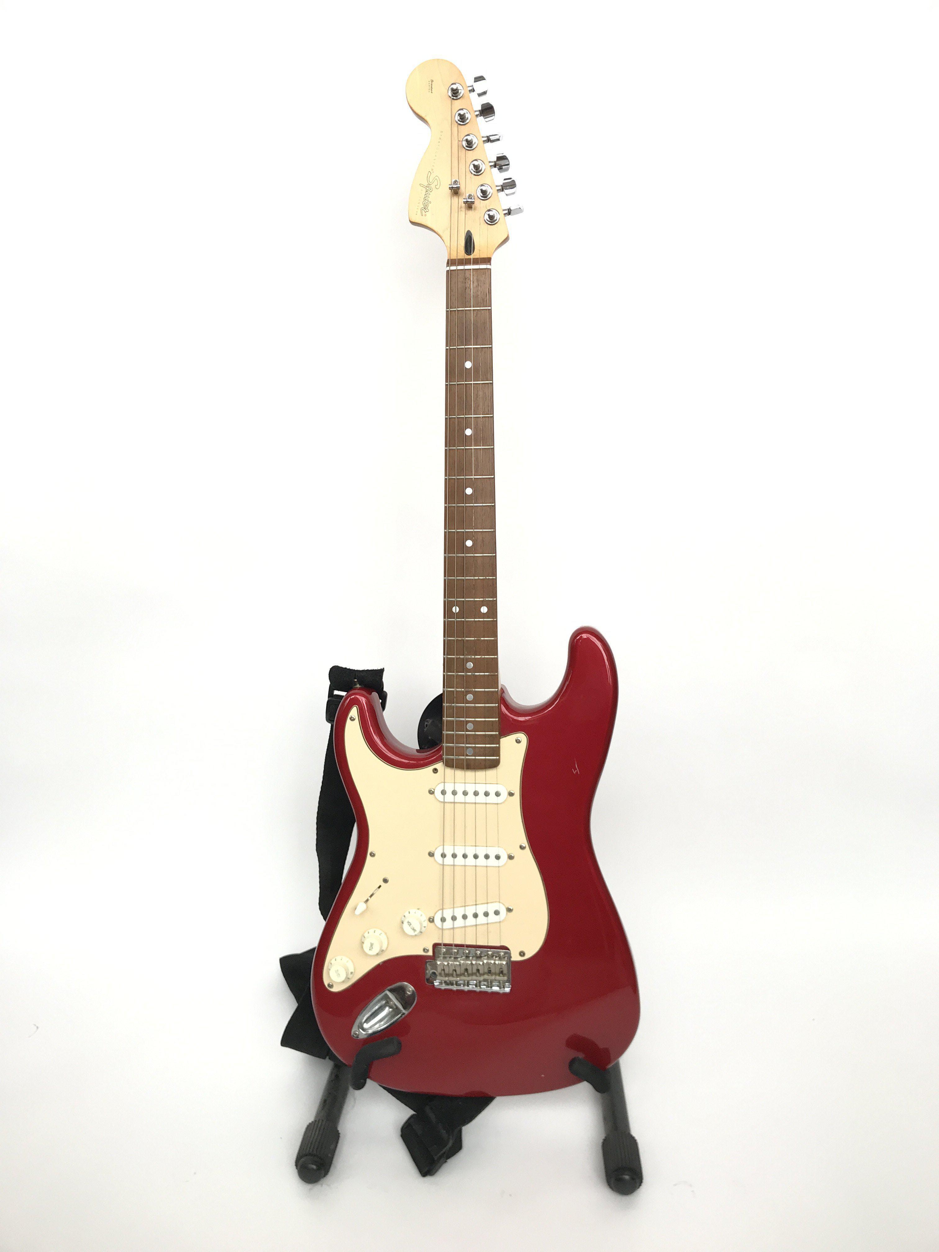 A left handed red Squier Stratocaster (standard se