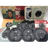 A collection of Elvis Presley EPs and 7inch single