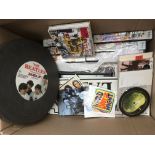 A box of Beatles fanzines, Anthology videos, CDs e