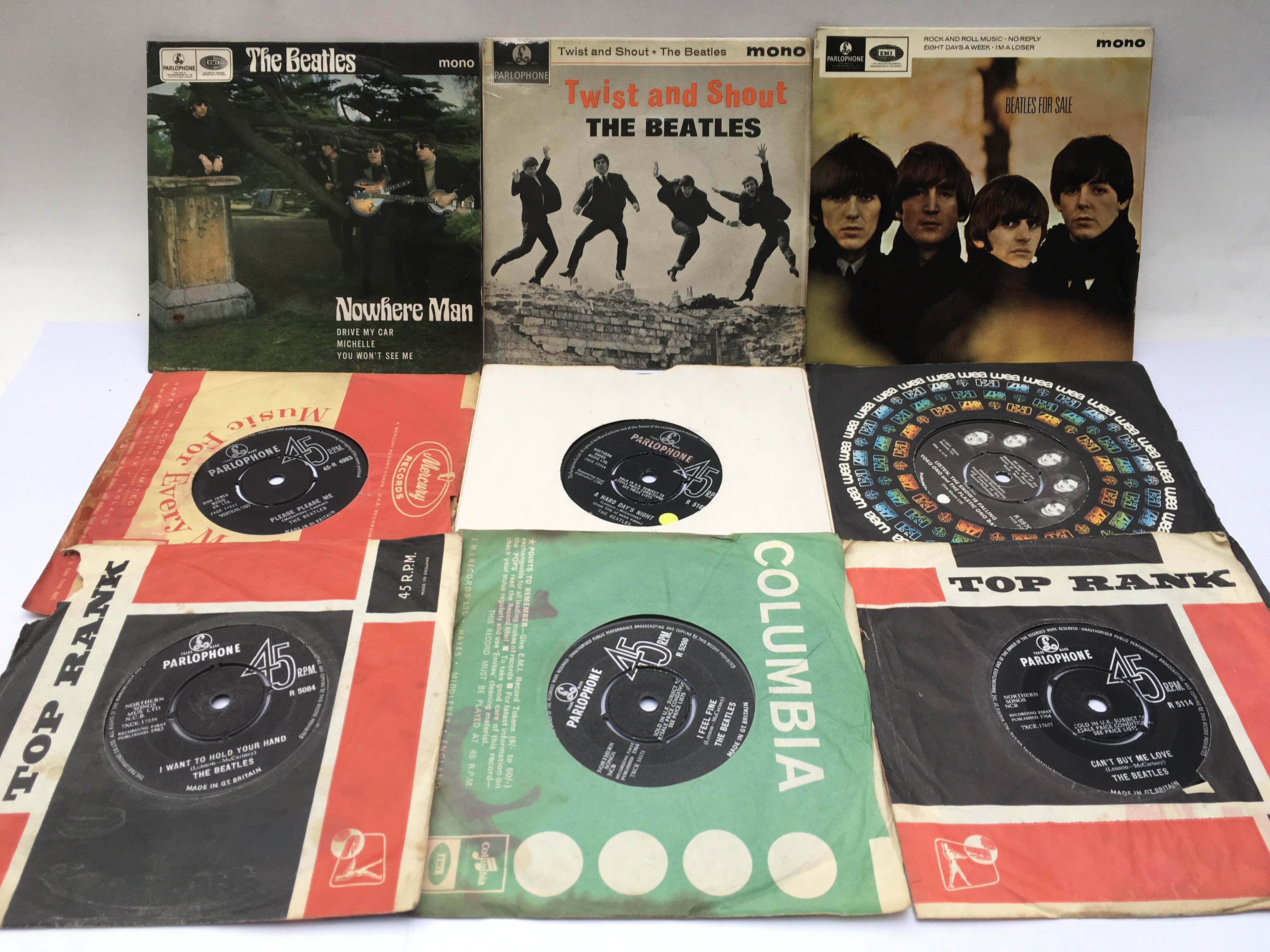 Three Beatles EPs and six 7inch singles.