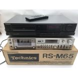 A boxed Technics RS-M65 cassette deck and a Techni