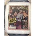 A framed and glazed signed Rolling Stone magazine