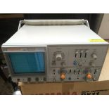 A boxed Topward 7021 oscilloscope.