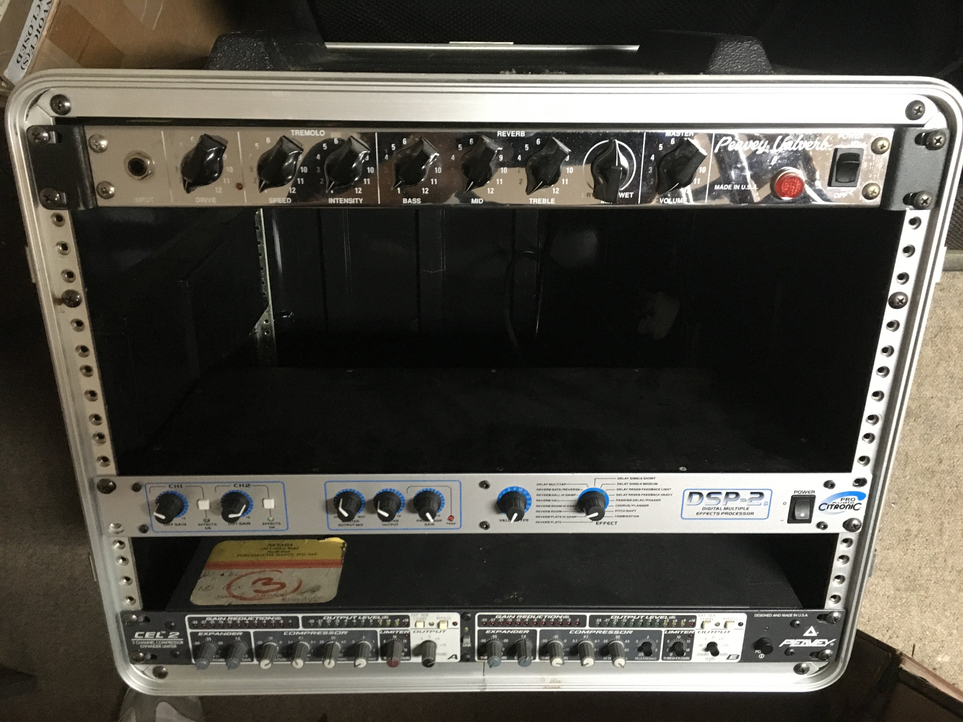 Three rack units comprising a Peavey Valverb, DSP2