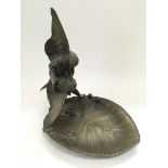A bronze sculptural dish marked Cain and depicting