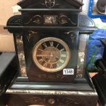 A Victorian slate mantle clock with grey marble an