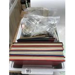 A large quantity of stamp albums and loose stamps.