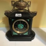 A classical slate mantle clock with green marble,