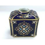 A Sevres tea caddy with enamel decoration and jewe