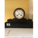 A Victorian slate metal clock with Roman numerals