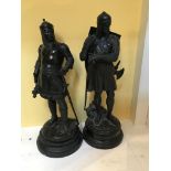 Two spelter figures in the form of knights. The he