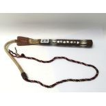 A vintage afghan camel whip with mother of pearl d