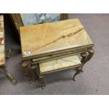 A gilt brass and onyx nest of 3 side tables.