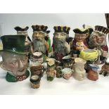 A collection of Caricature jugs including Beswick