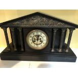 A Victorian slate mantle clock of classical influe