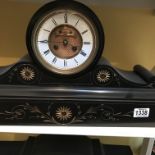 A Victorian slate visible escapement mantel clock