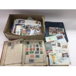 A box of stamp, loose and in binders plus various