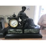 A slate mantel classical style clock surmounted wi