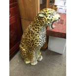 A large ceramic model of leopard.