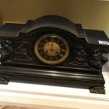 A Victorian slate clock in a classical style with