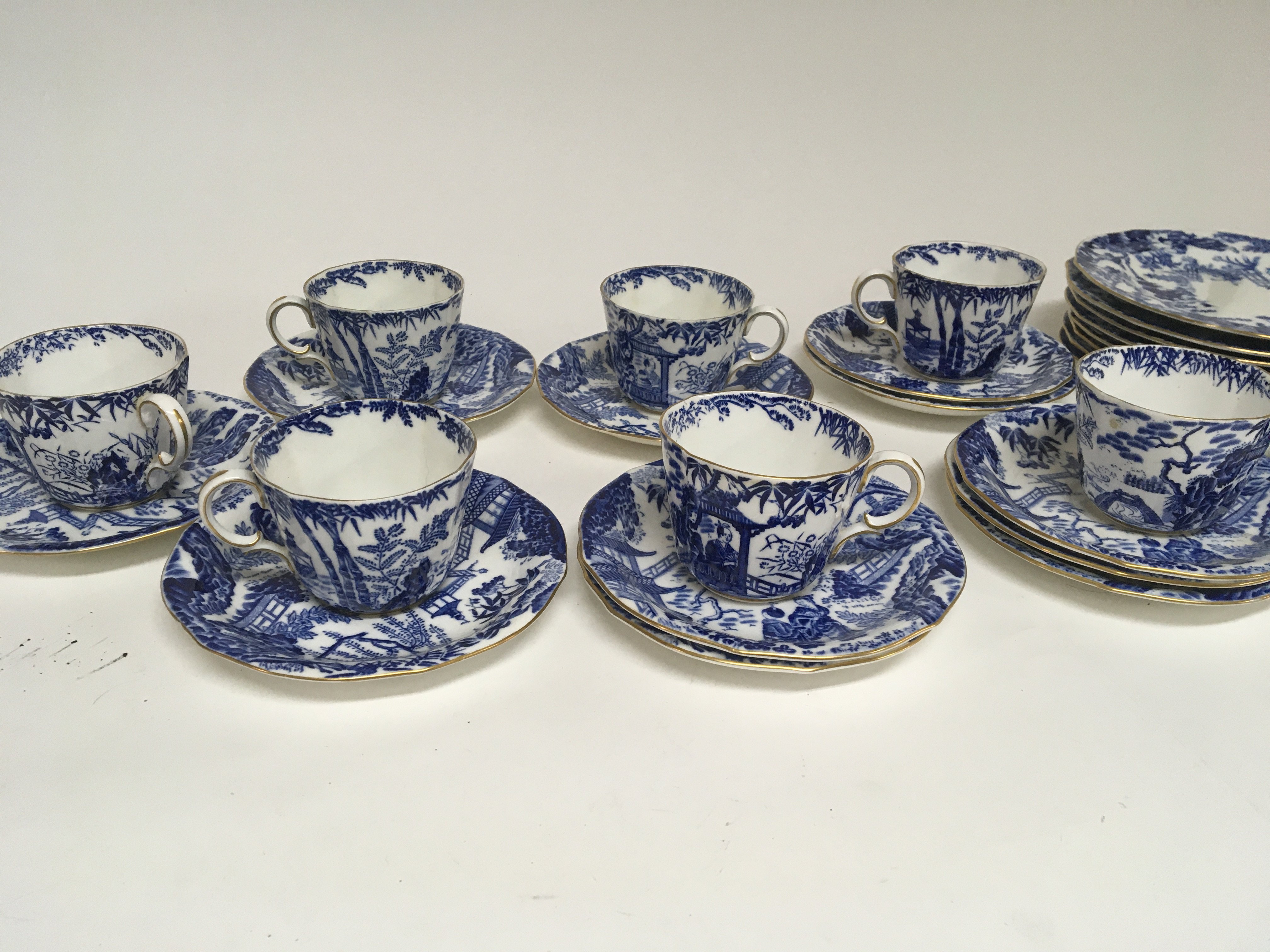 A Royal Crown Derby Porcelain tea set seven cups s