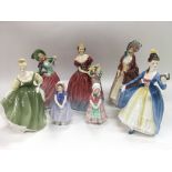 Seven Royal Doulton figures of ladies comprising '